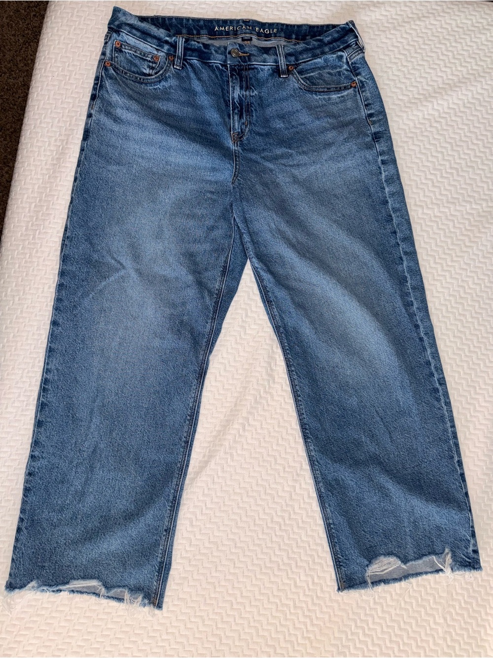 American Eagle Outfitters curvy stovepipe raw hem jeans
